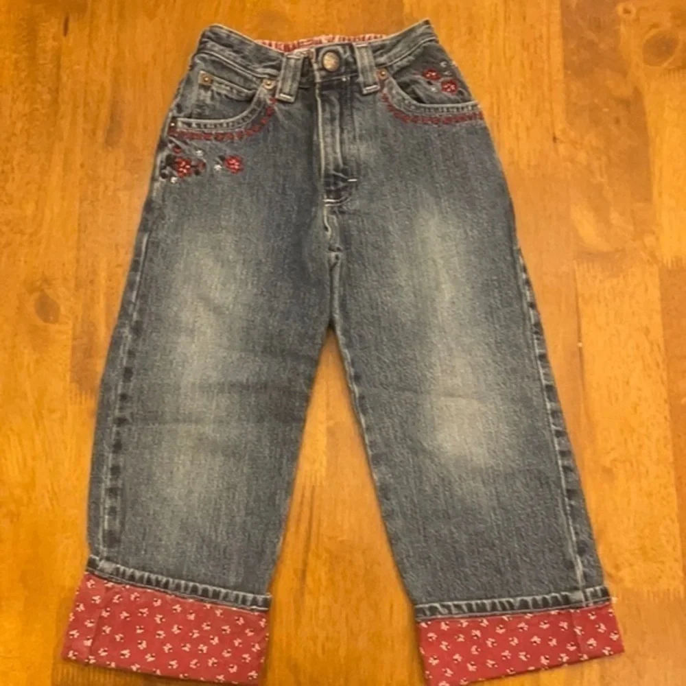 Kids jeans with red flowers 104